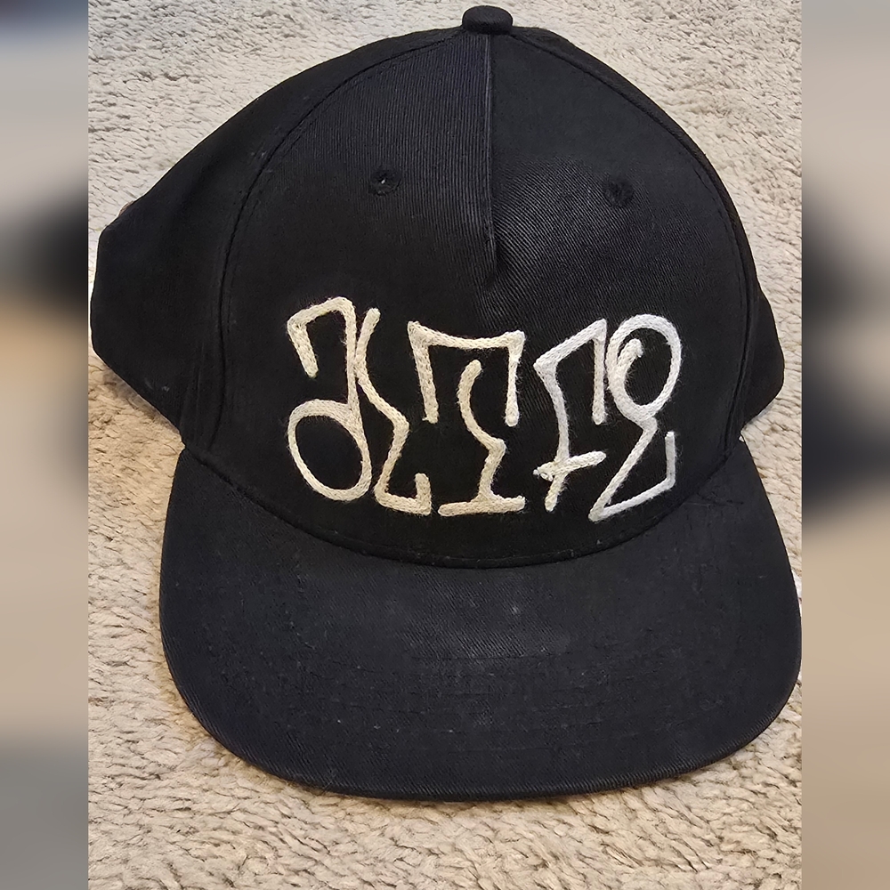 Black Cap with White Embroidery
